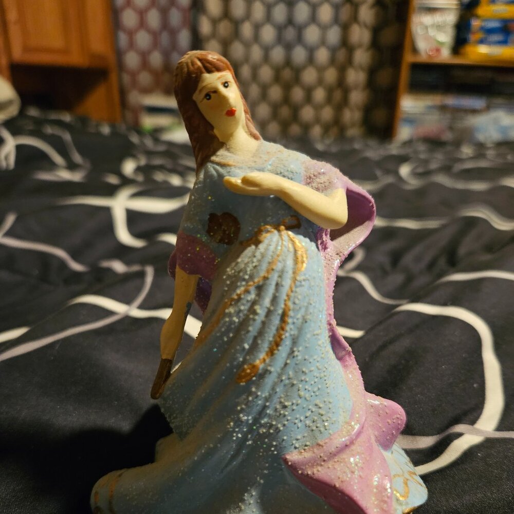 A little ceramic doll